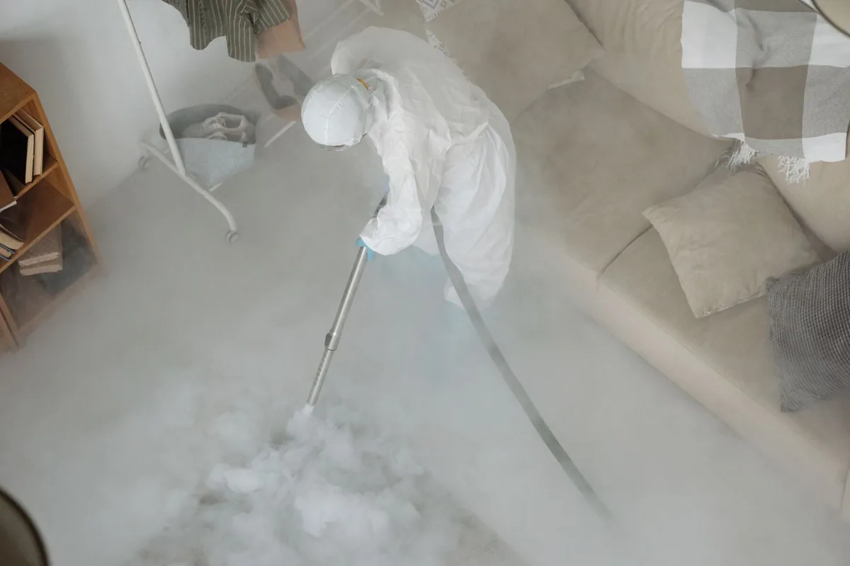 Biohazard cleanup technician in protective equipment, Elizabeth, NJ